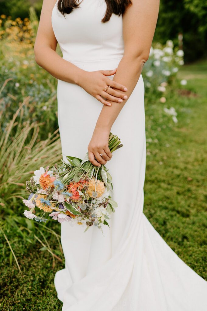 A close-up of a bridal bouquet, highlighting the editing style and detail-oriented approach you should look for when selecting your wedding photographer.
