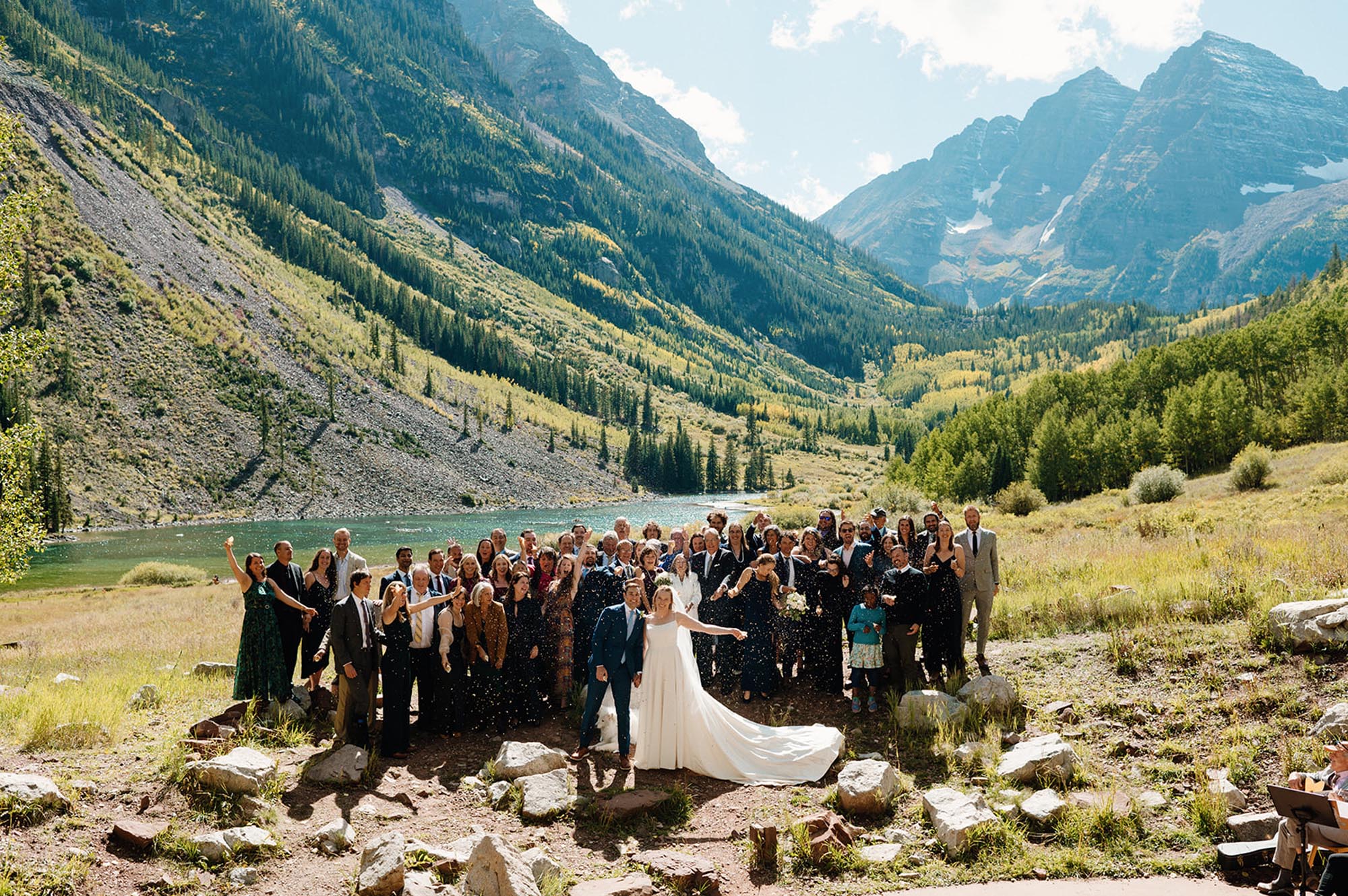 family posing at one of the most scenic and best small wedding venues in Colorado