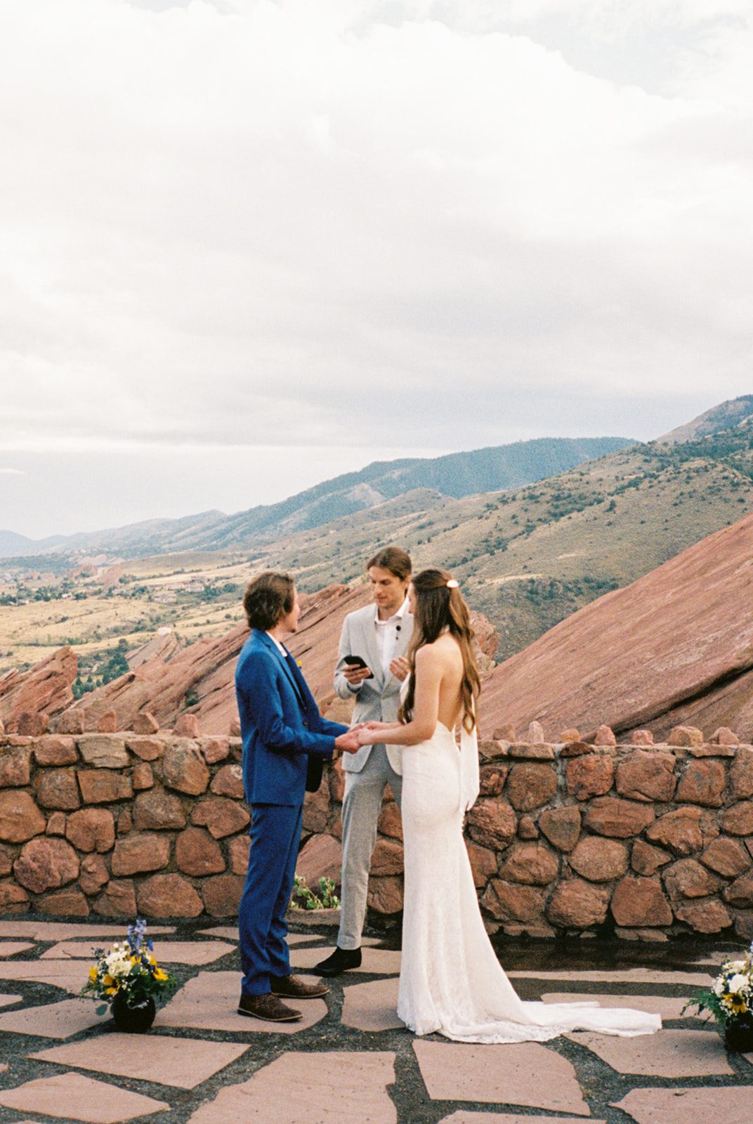 Bride and groom exchanging vows during a small ceremony at an intimate wedding venue in Colorado